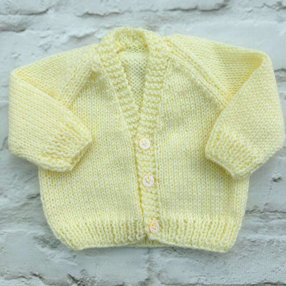 Hand knitted personalised baby cardigan in lemon, newborn — made to order in the UK | Little Name Knits
