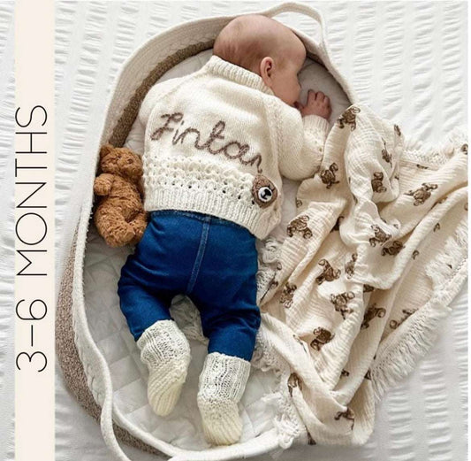 Personalised hand knitted cream baby cardigan showing embroidered name, 3-6 Months | Little Name Knits