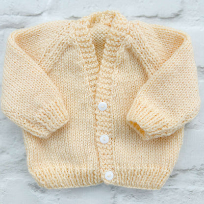 Hand knitted personalised baby cardigan in biscuit colour, newborn — made to order in the UK | Little Name Knits