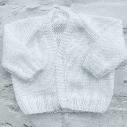 Hand knitted personalised baby cardigan in white, newborn — made to order in the UK | Little Name Knits