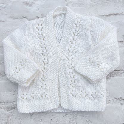 Hand knitted personalised baby cardigan in detailed white, size 0-3 months — made to order in the UK | Little Name Knits