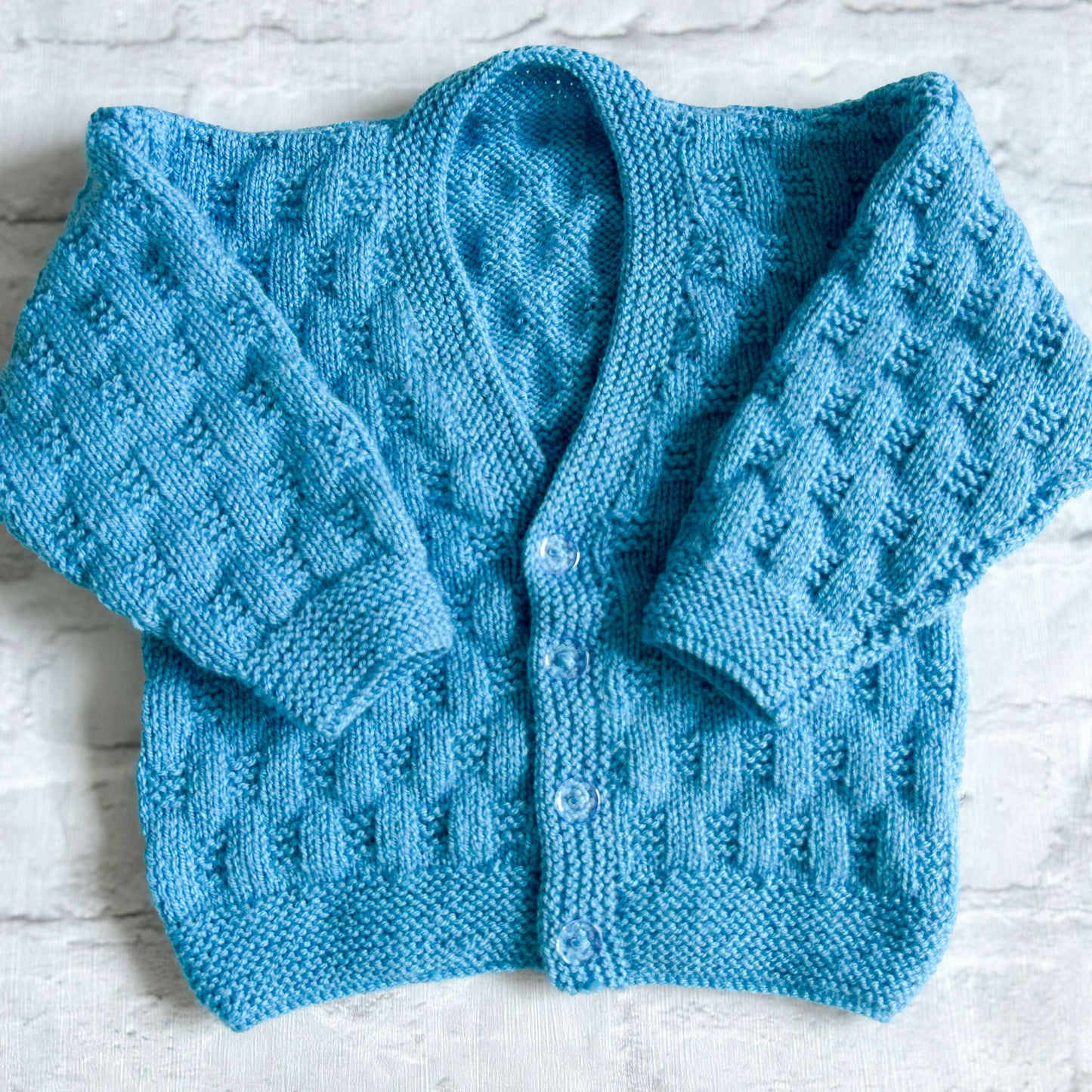 Hand knitted personalised baby cardigan in blue, 18 months plus (2-3 years)— made to order in the UK | Little Name Knits

