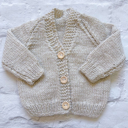 Hand knitted personalised baby cardigan in light beige shade 'moon' , size newborn  — made to order in the UK | Little Name Knits