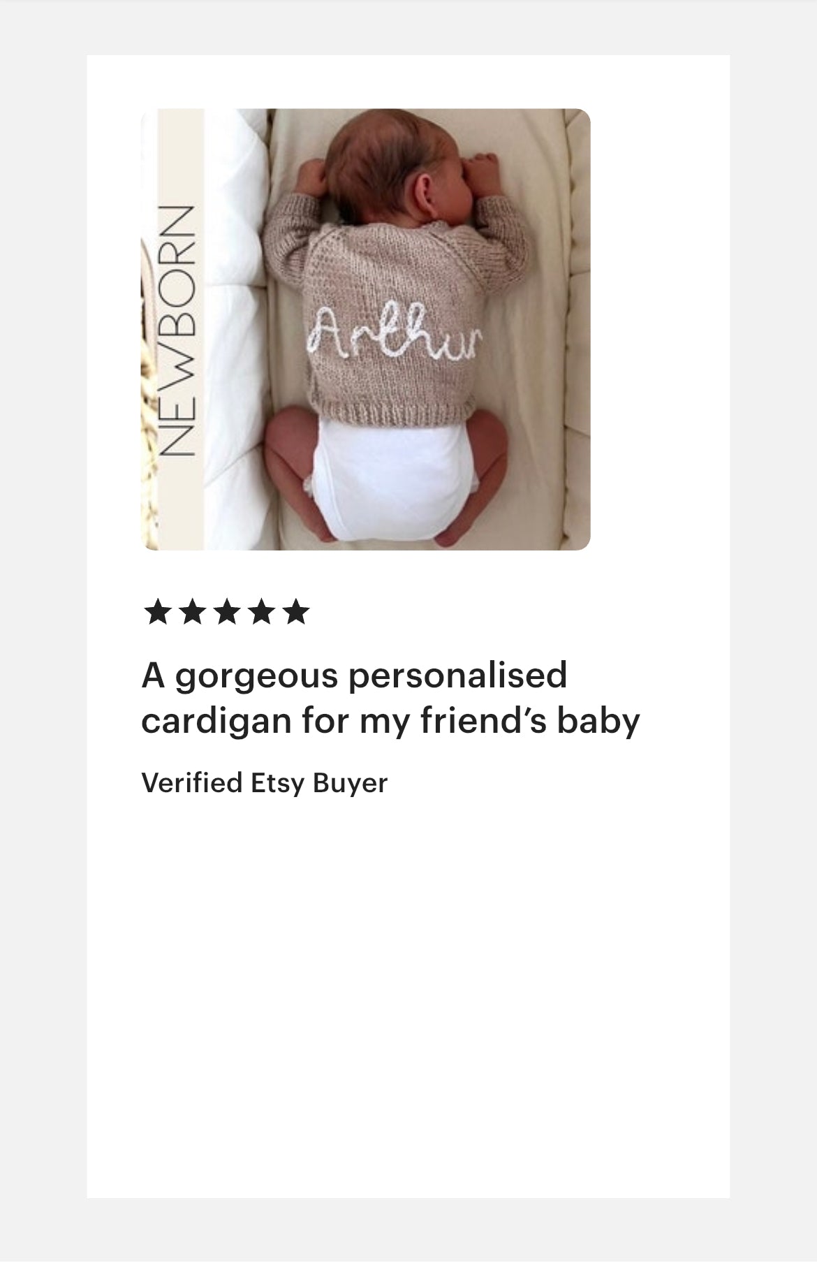Newborn baby wearing a personalised cardigan with 'Arthur' on it, set against a white background. with a five star product review from verified etsy buyer