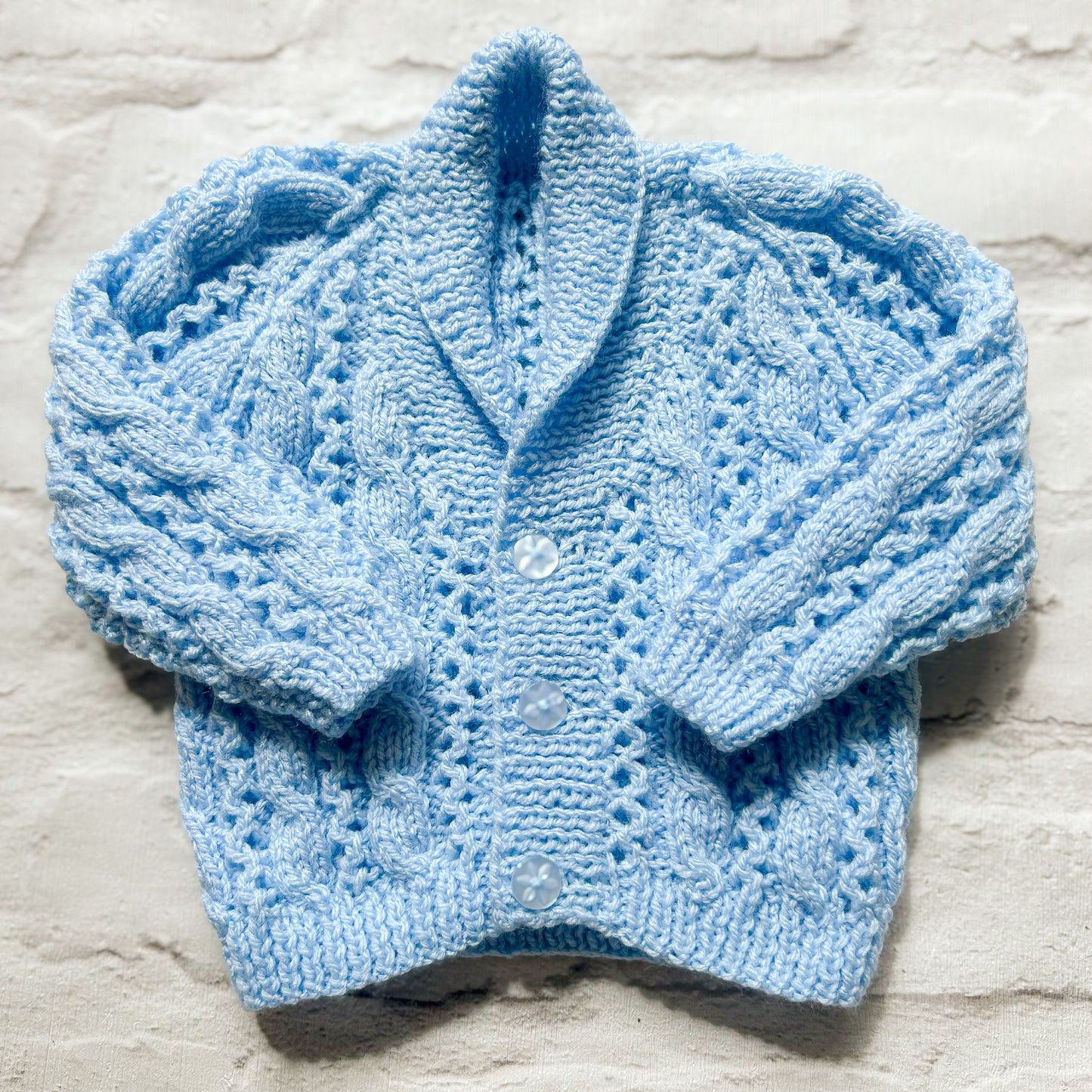 Hand knitted personalised baby cardigan in blue size 0-3 months — made to order in the UK | Little Name Knits