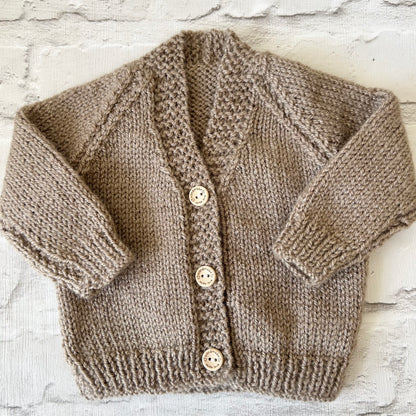 Hand knitted personalised baby cardigan in fawn brown size 0-3 months — made to order in the UK | Little Name Knits